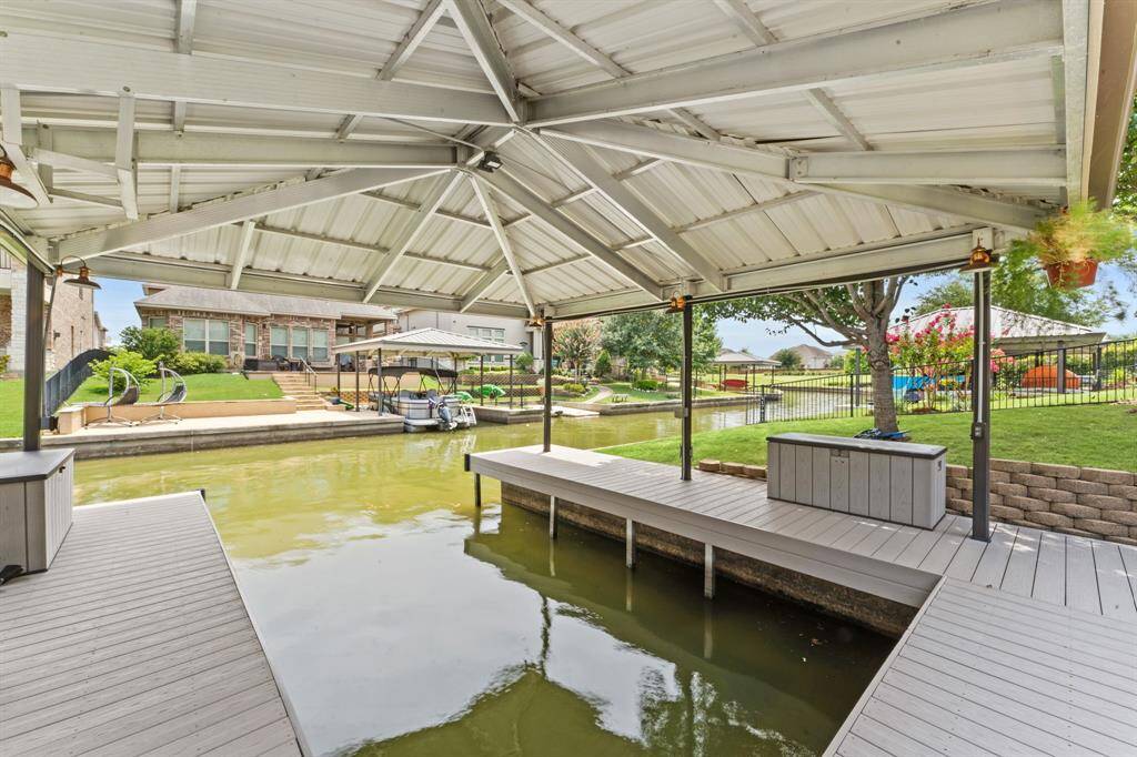Boathouse and dock with lighting and electrical outlets