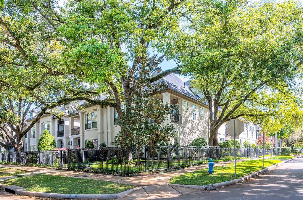 Beautiful, gated front and side yards provide plenty of space for play and pets. The lush landscaping has been recently refreshed.