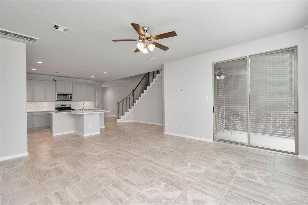 Sliding door leads to back yard