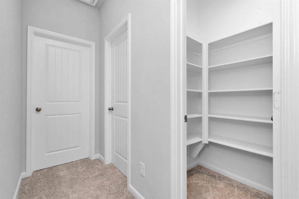 Linen Closet upstairs across from secondary bathroom
