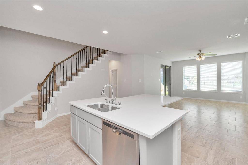 Kitchen looking into living room