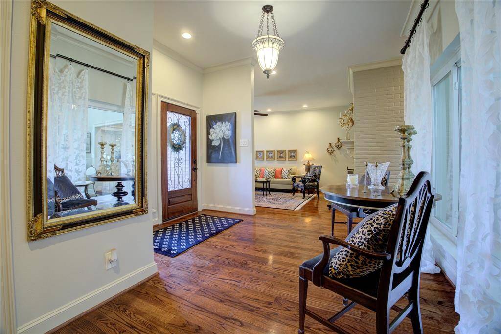 Another view of the entry with a glimpse into the living room.