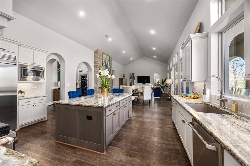 A Chefs dream with butlers walkthrough pantry accents the stunning kitchen