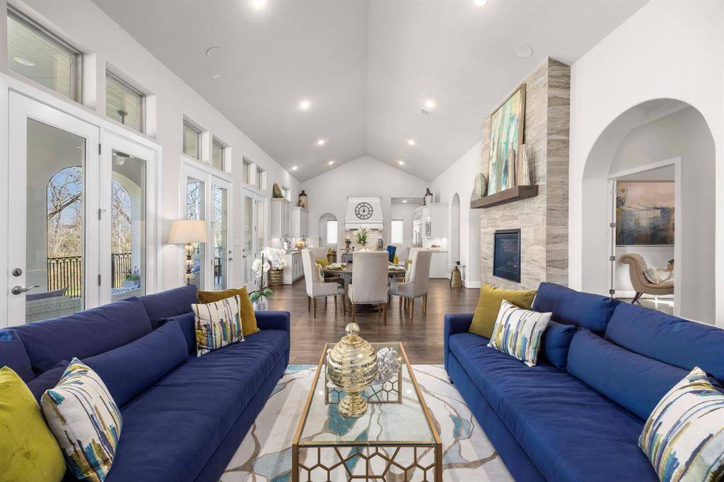 Your family room surrounded by the fireplace, kitchen and study makes the open concept functional