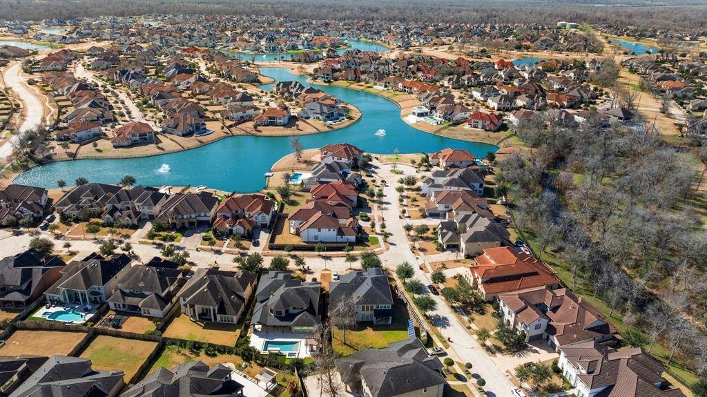 Only Steps from the Lake this premium lot features no back neighbors and Lush green space in back Where you will catch wildlife