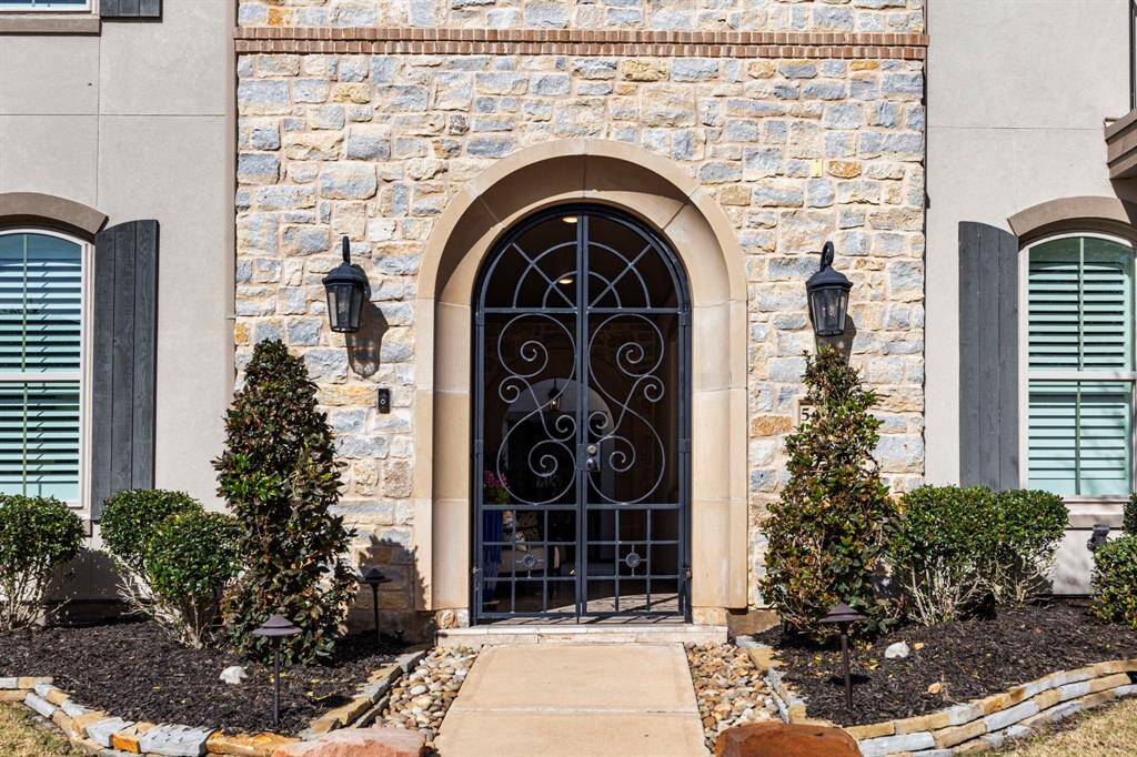iron gate leads to private courtyard