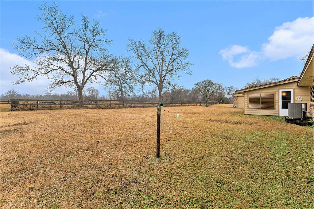 Spacious backyard with ample room for a pool.