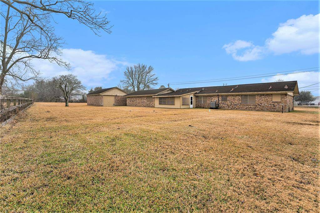 This Home  has a 4 car Garage.  Plenty of space for Storage or that old Classic Car.