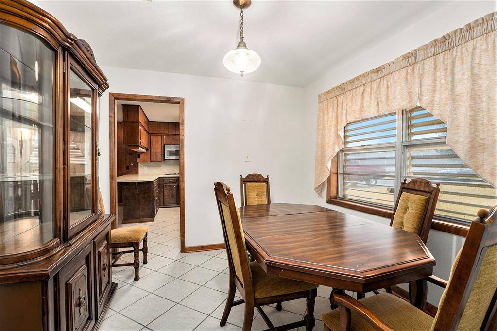 Elegant dining room seamlessly connected to the kitchen.
