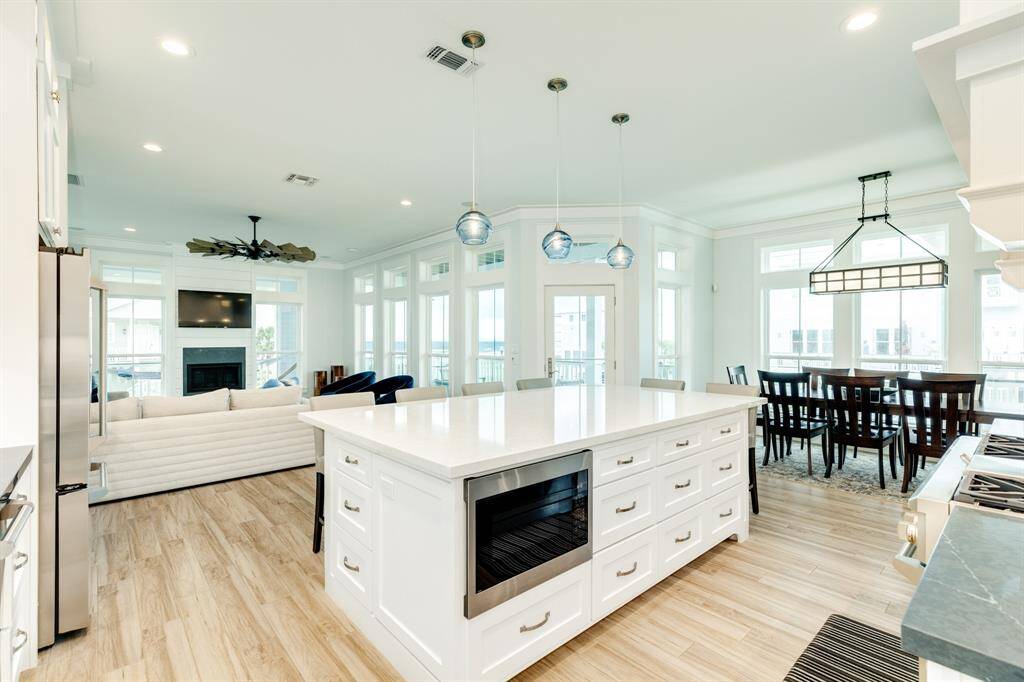 Look at all of the storage in the island!  Under-counter microwave.