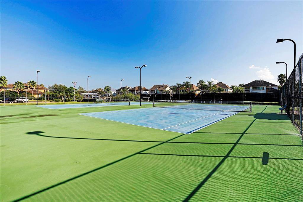 EMJOY TENNIS JUST A BLCOK AWAY FROM THE LOT.