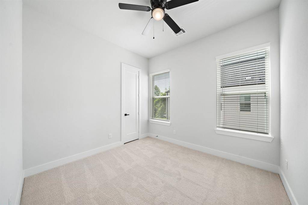 Fourth bedroom is located at the top of the stairs and could be used as flex space or home office.