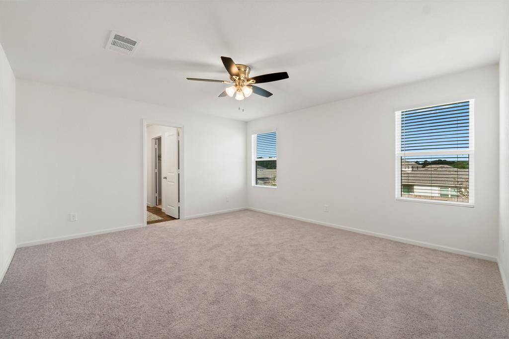 This primary suite is the perfect sanctuary to unwind after a long day!