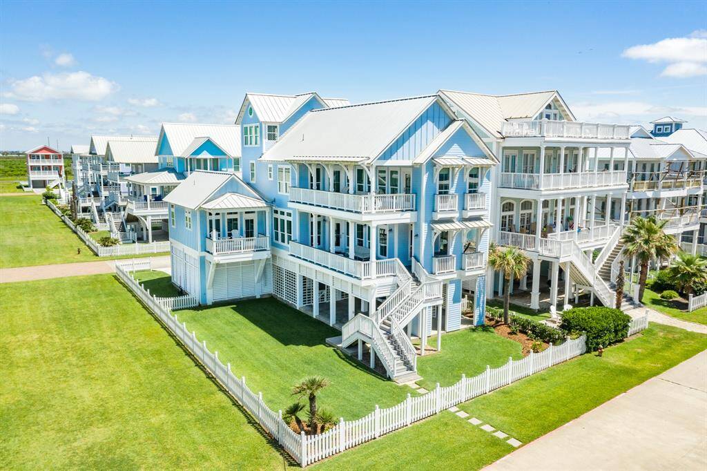 Look at the creative design of this second row home! Each architectural element is a visual surprise. Sitting adjacent to the greenbelt affords an amazing view from this home. The side-yard is a fun space for playing all sorts of yard games!