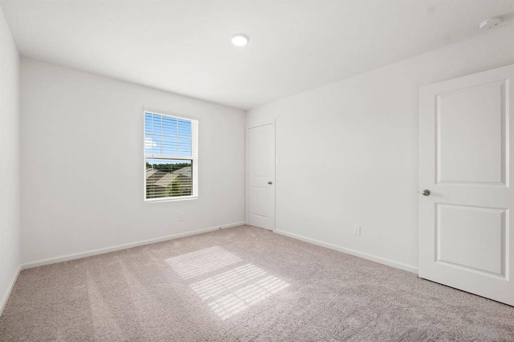 Another view of this secondary bedroom.