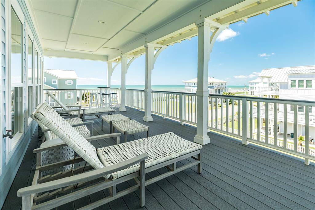 Lounge and enjoy the beach view from this amazing porch