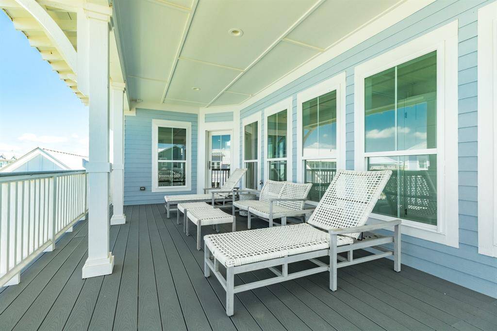 Beautiful outdoor furnishings convey in the purchase of this home.