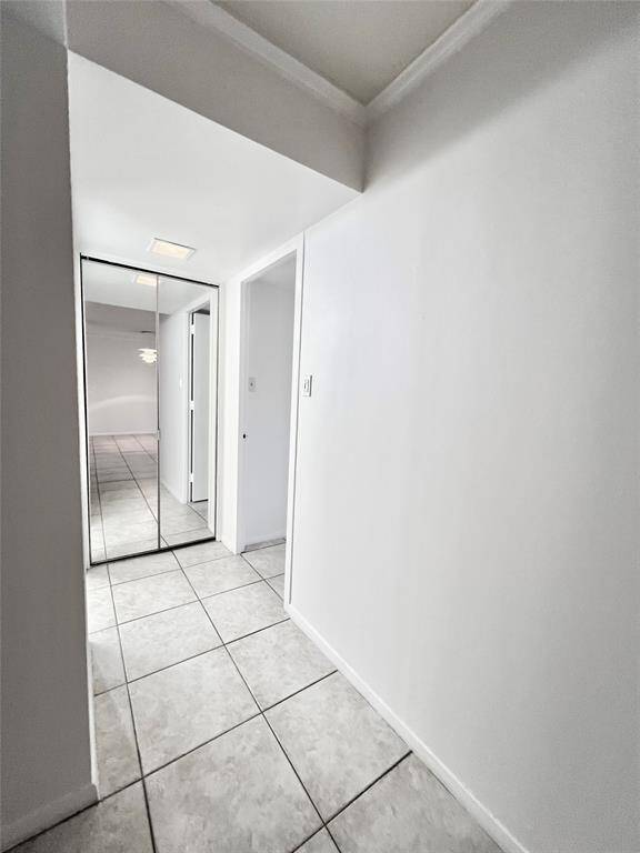 Hallway to bedroom and bathroom