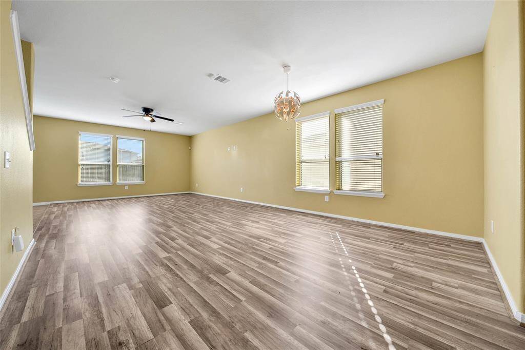 Living and dining combo with lots of natural light.