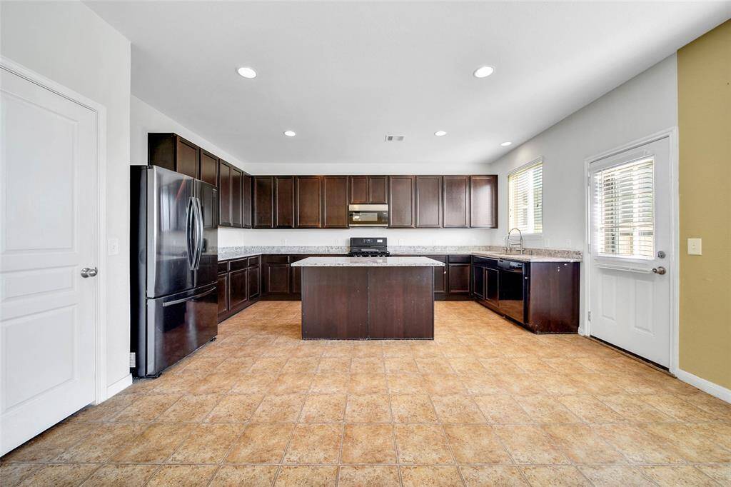 Expand out in this Kitchen. Do you have more than 1 cook in your family?  Endless counter space and an abundance of cabinets.