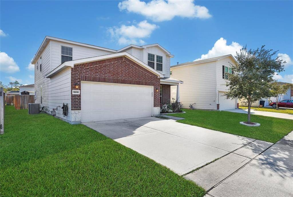 Double wide drive and 2 garage.
