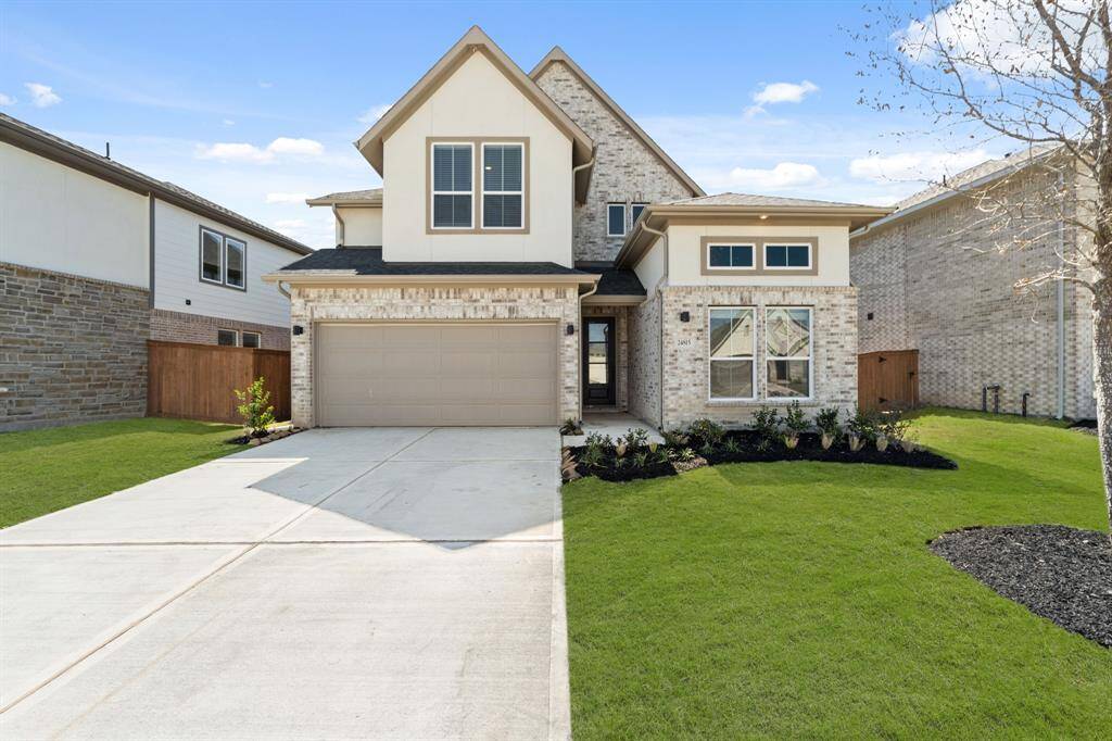 The Tutor Elevation of Newmark Homes' Newton Plan showcases a charming blend of traditional architectural elements with modern functionality.