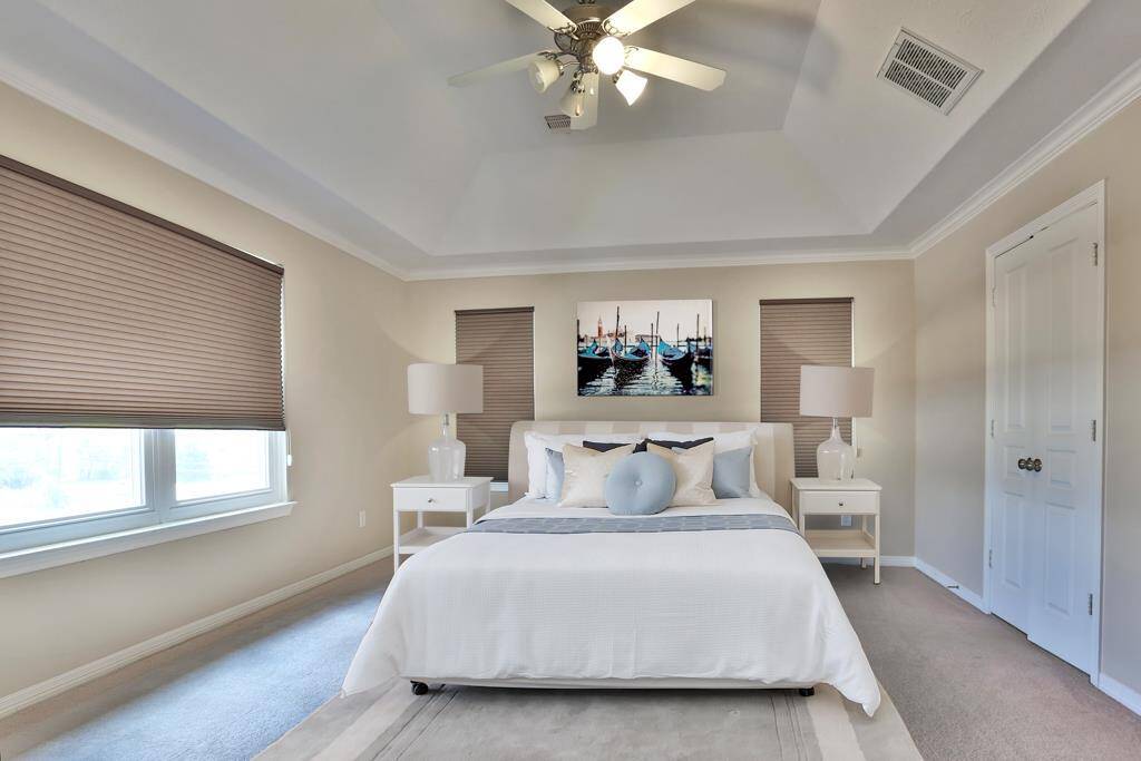 Master bed.  Living in city but not sacrificing your peace with these upgraded noise and storm resist windows