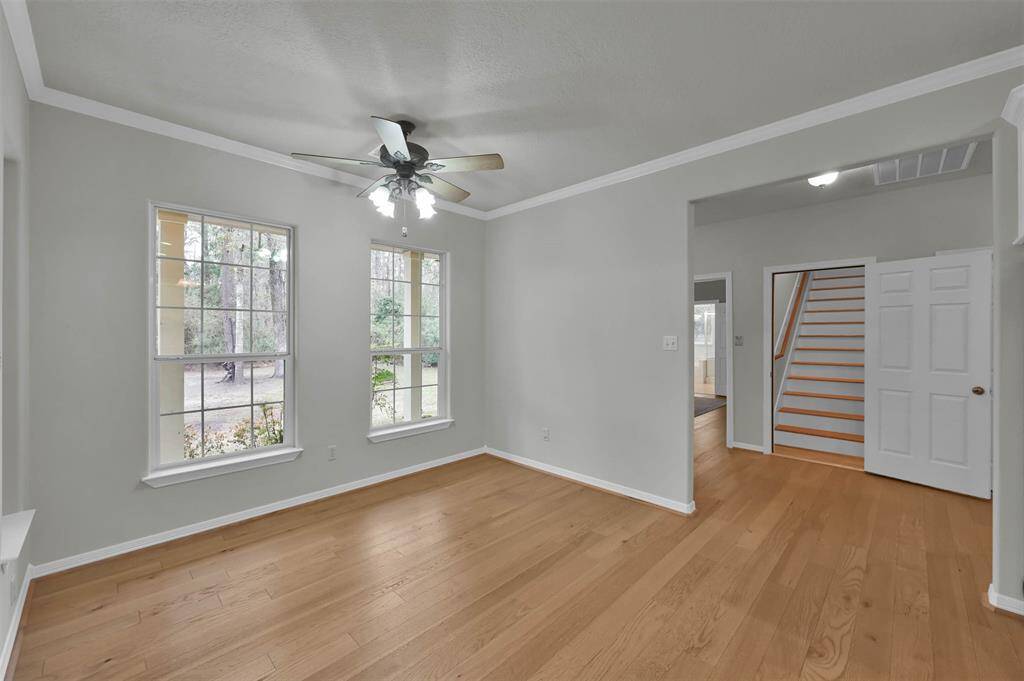 Charming breakfast nook adjacent to the kitchen, with serene views of the backyard.