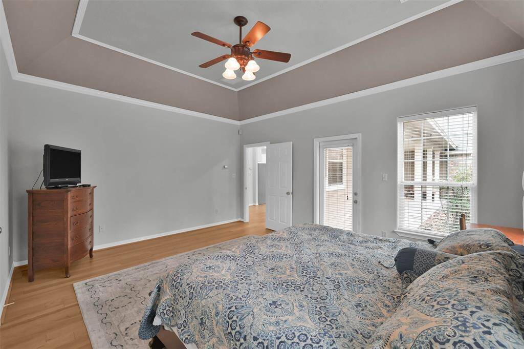 Spacious primary bedroom with a split floor plan for enhanced privacy.
