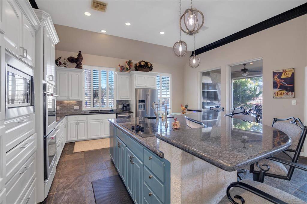 Kitchen includes an abundance of cabinet space
