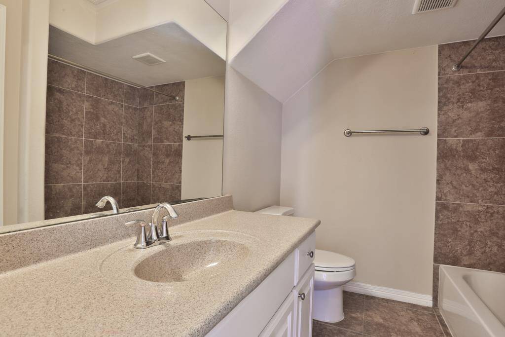 Third bedroom on first floor, with upgraded noise  storm resist doors and windows, can be used as an office