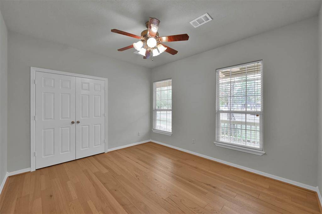 Bedroom 3. beautiful view of the front yard and large wrap around porch