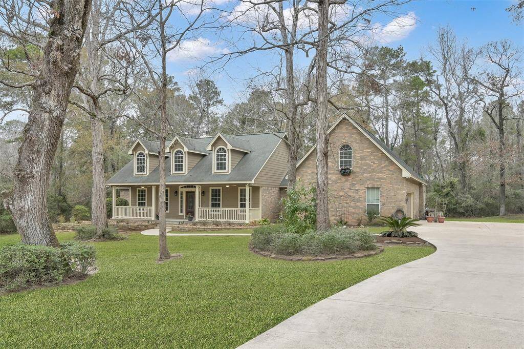 Explore serene living in this stunning custom home on a spacious 2-acre lot in Ridgelake Shores.