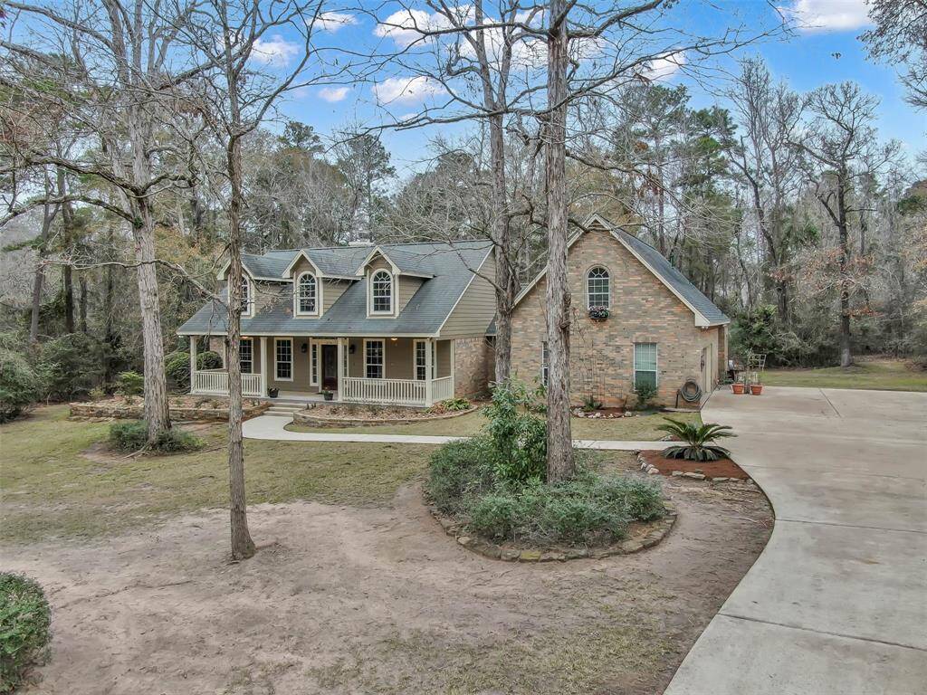 Stunning aerial view showcasing the charming front façade of your potential new home.
