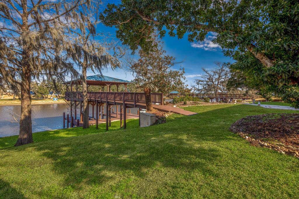 View of spacious yard and boat dock