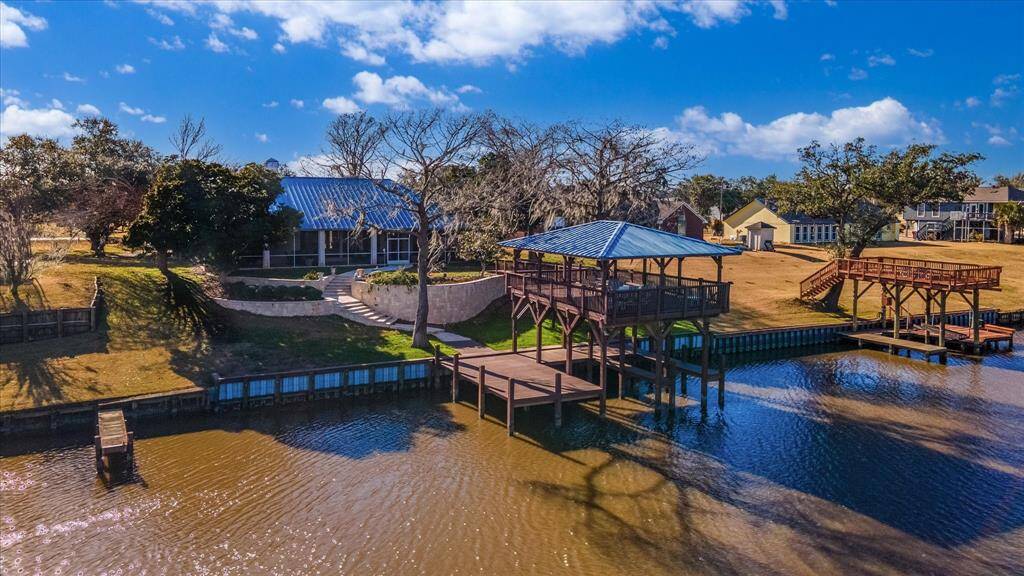 Aerial shot of boat dock and back of house