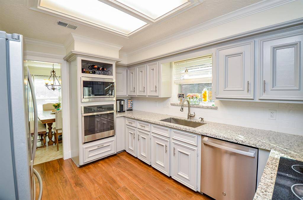 You have a built in microwave & oven in this awesome kitchen.