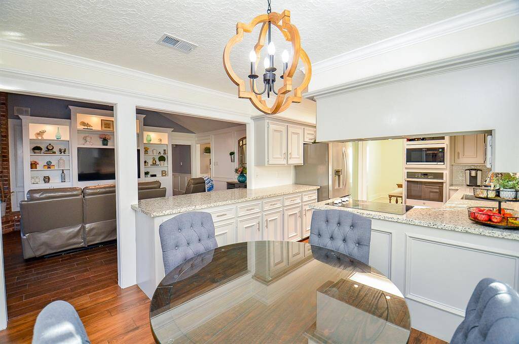 This is a photo taken from the breakfast area taken towards the kitchen & den.