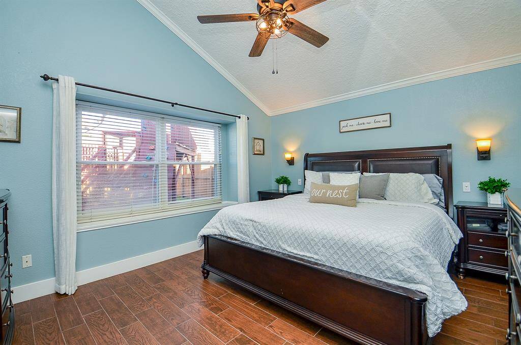The master bedroom suite is located at the back of the home for privacy.