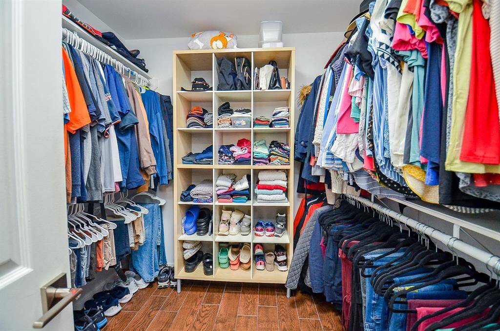 The master closet is huge with loads of storage,