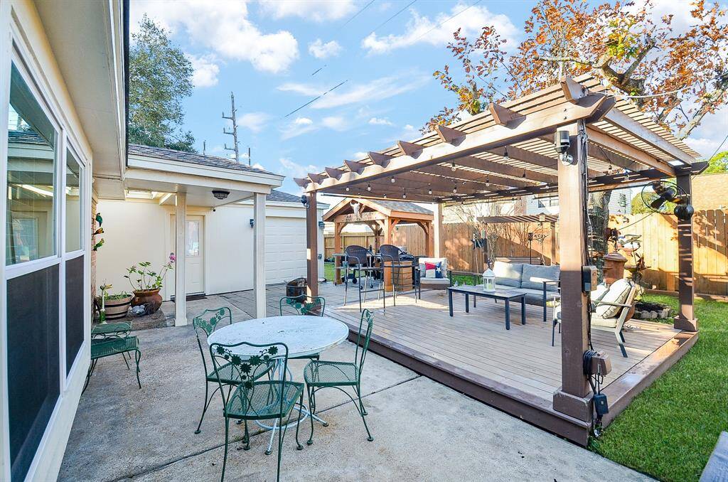 There is lots of poured cement in the back yard making entertaining easy.