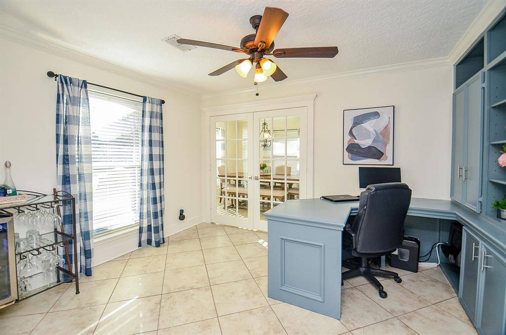 The study flanks the entrance & it has wonderful built ins.