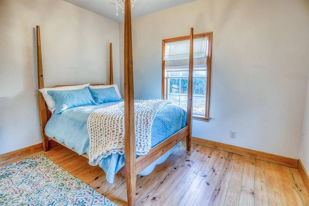 2nd of 3 bedrooms. Large closet space & natural light.