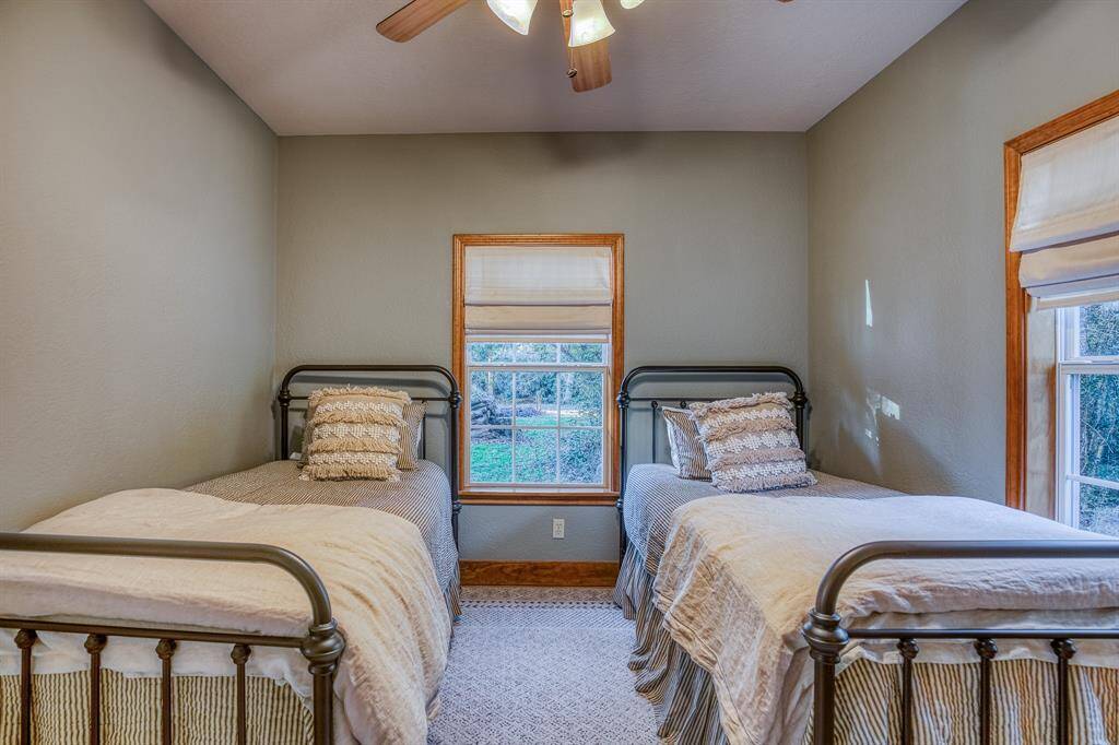3rd bedroom w/twin beds & an oversized walk-in closet.