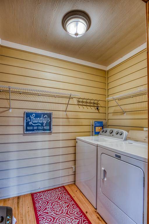 Laundry room located inside home, just off of library area.
