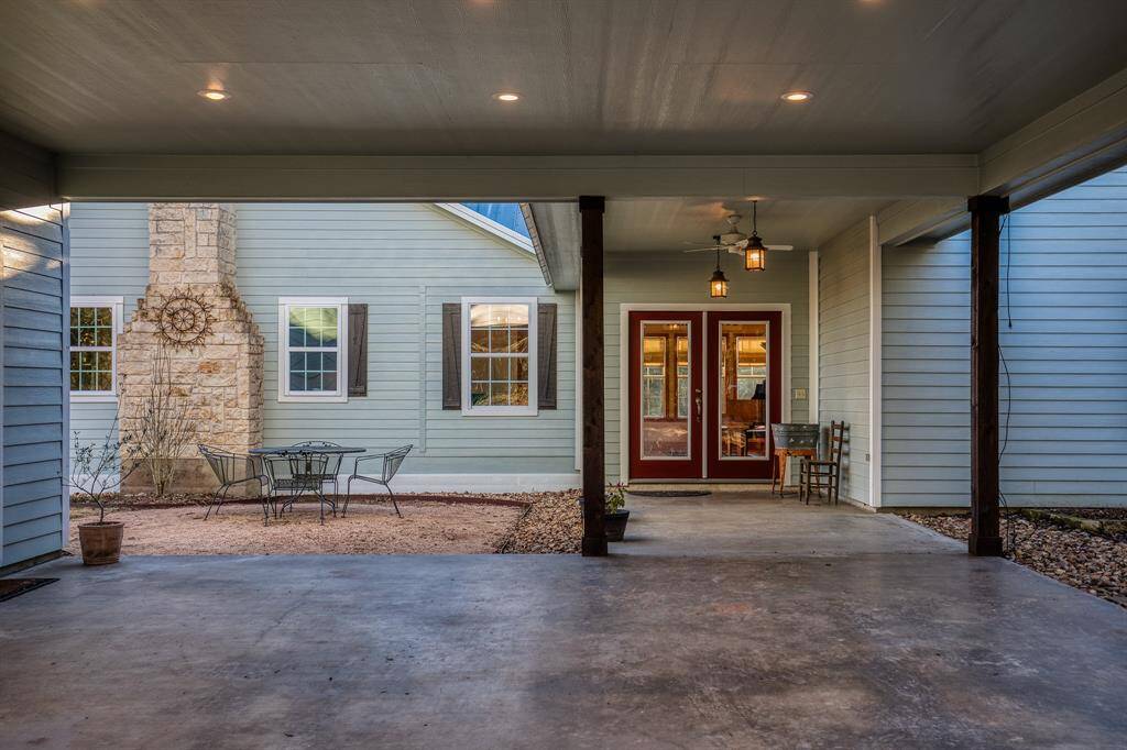Covered parking & walkway into side of home.