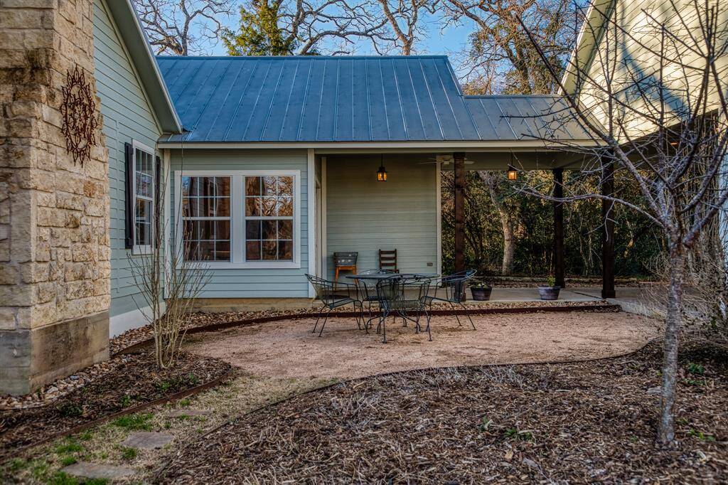 Enjoy the perfect courtyard under the stars. The rock and landscaping were provided by Glasco.