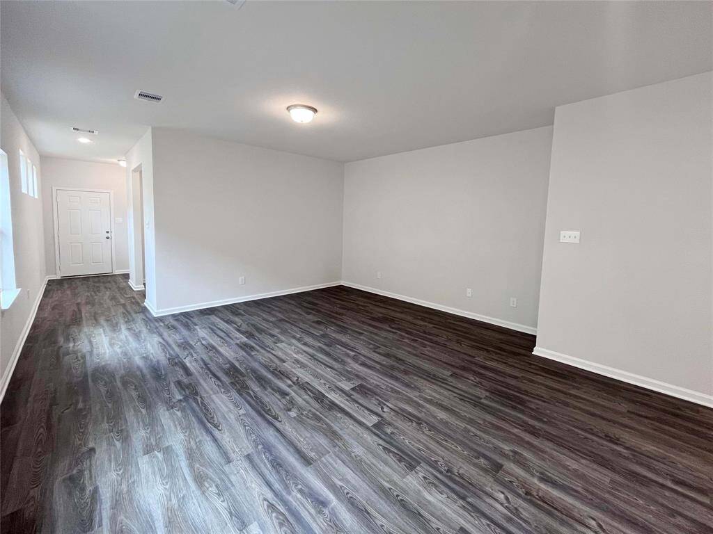 The Mockingbird II- Breakfast Area into Family Room. Sample photo used for illustrative purposes only, options/colors will vary.
