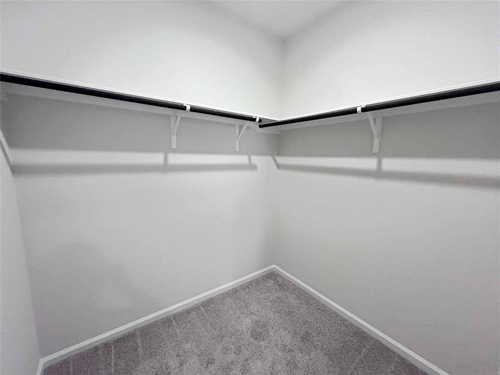 The Robin II- Primary Bedroom Closet. Sample photo used for illustrative purposes only, options/colors will vary.