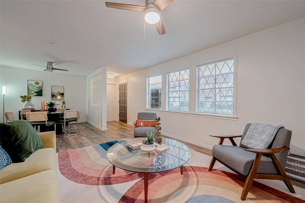 Spacious and inviting living area with abundant natural light—perfect for relaxing or entertaining.
